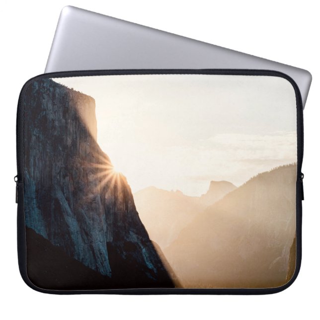 BROWN ROCKY MOUNTAIN DURING DAYTIME LAPTOP SLEEVE (Front)