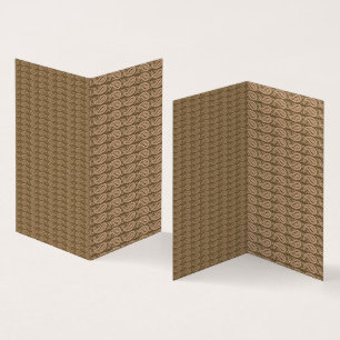 Brown rug featuring a detailed motif pattern with 