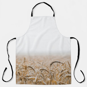 BROWN WHEAT FIELD DURING DAYTIME APRON
