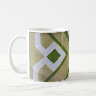 Brown, white, and green textile close-up photograp coffee mug