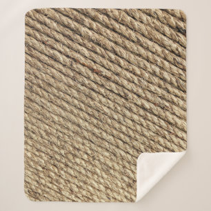 Brown wicker mat sherpa blanket