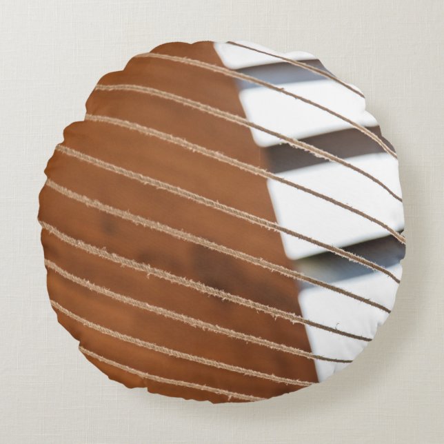 Brown window blinds during daytime round cushion (Front)