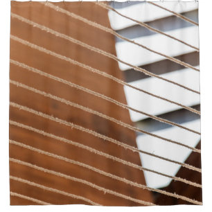 Brown window blinds during daytime shower curtain