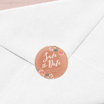 Brown Wood and Floral Rustic Save the Date Classic Round Sticker<br><div class="desc">This rustic Save the Date round sticker features lovely floral against a brown wood pattern background. They're perfect for a rustic wedding. Use it to seal your envelopes, favour bags or for decoration. Check out other matching rustic wedding items including invitations here http://www.zazzle.com/collections/brown_wood_rustic_floral_wedding_collection-119146535042869019?rf=238364477188679314 Personalise it with your details by replacing...</div>