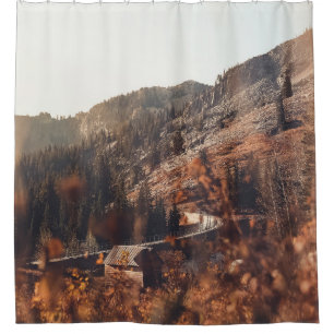 BROWN WOODEN BRIDGE ON BROWN ROCKY MOUNTAIN DURING SHOWER CURTAIN