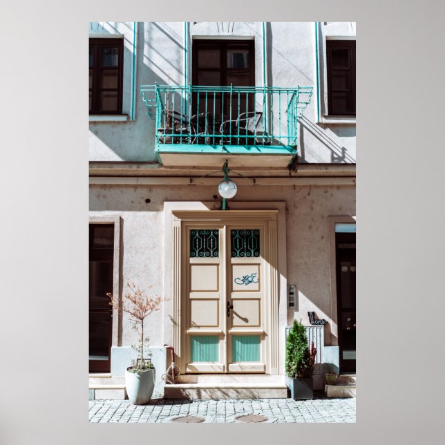 Brown wooden door on white concrete building poster (Front)