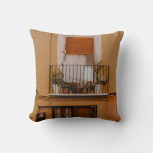BROWN WOODEN WINDOW FRAME WITH GREEN PLANTS CUSHION