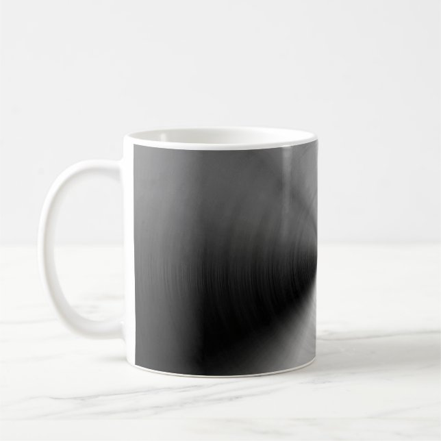 Brushed silver metal coffee mug (Left)