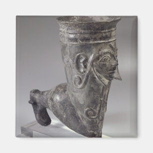 Bucchero vessel in the form of a leg with sculpted magnet