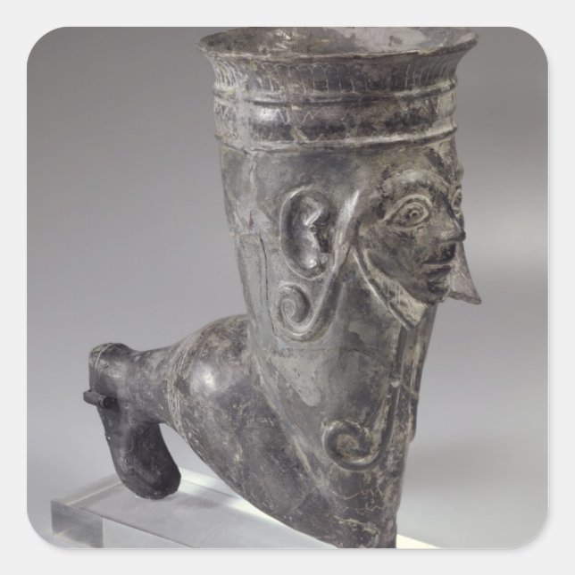 Bucchero vessel in the form of a leg with sculpted square sticker (Front)