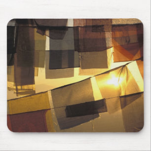 Buddhist prayer flags in the sunset, mouse mat