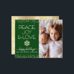 Budget Holiday Gold Green Photo Peace Love Card<br><div class="desc">“Peace, joy & love.” A fun, playful, faux champagne gold foil and white snowflake illustration, gold foil confetti dots, and gold foil and white modern typography on a hunter green background, along with the custom photo of your choice, help you usher in the holiday season. A random white snowflake pattern...</div>