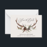 budget Rustic floral stag wedding save the date Card<br><div class="desc">budget Rustic foliage,  floral and stag antlers wedding save the date card. With beautiful watercolor foliage,  white florals,  wood slice and script hand writing. This modern invite is sure to set the style for your upcoming party.</div>