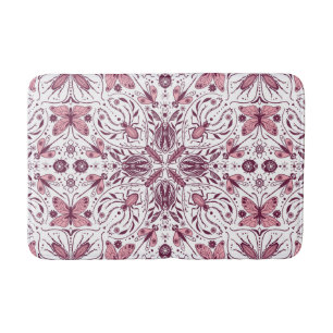 Bugs, dark magenta and pink on white bath mat