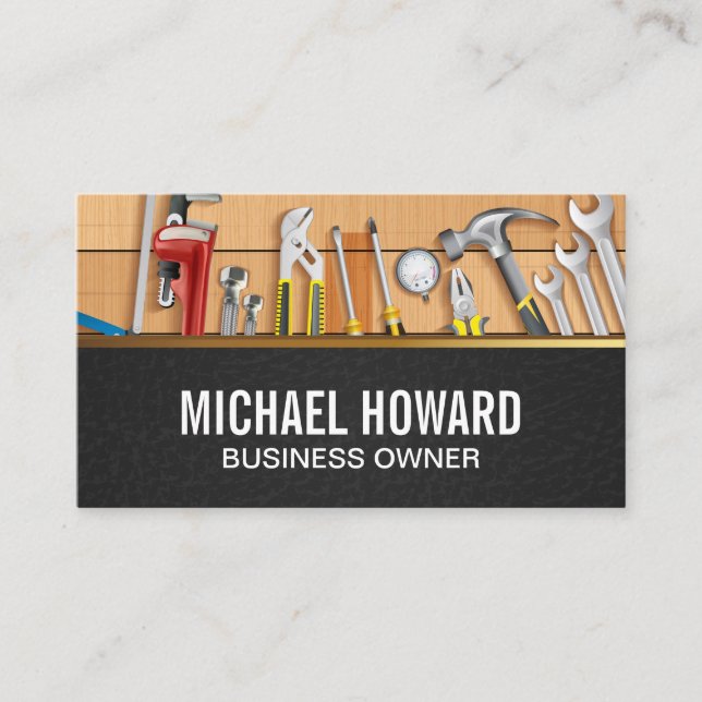 Builder Repair Tools on Wood Table Business Card (Front)
