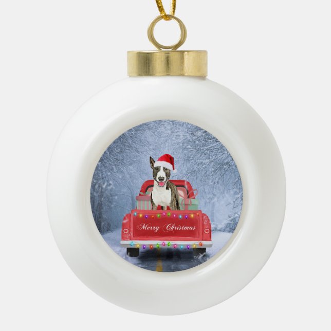 Bull Terrier Dog in Snow sitting in Christmas Ceramic Ball Christmas Ornament (Front)