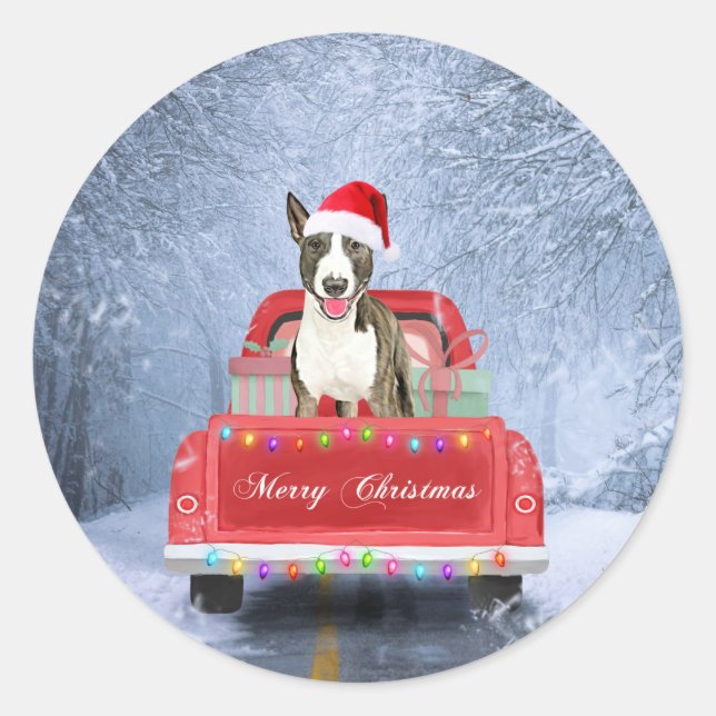 Bull Terrier Dog in Snow sitting in Christmas Classic Round Sticker (Front)