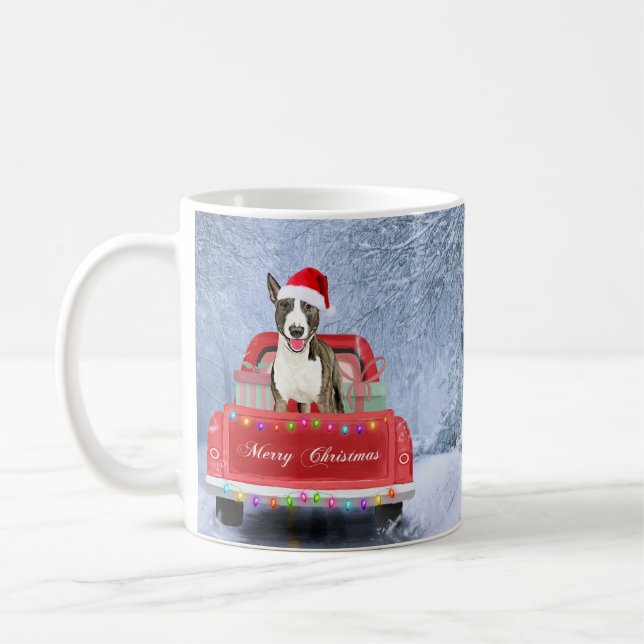 Bull Terrier Dog in Snow sitting in Christmas Coffee Mug (Left)