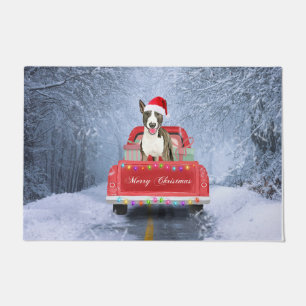 Bull Terrier Dog in Snow sitting in Christmas  Doormat