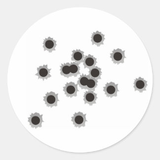 Bullet holes from a rifle or gun, possibly shotgun classic round sticker