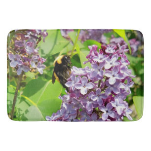 Bumblebee  On Lilac close up by djoneill Bath Mat