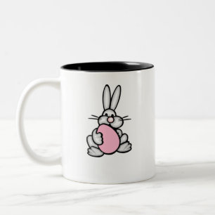 Bunny holding a Light Pink Egg Two-Tone Coffee Mug