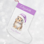 Bunny in Purple Santa's Hat Personalised  Small Christmas Stocking<br><div class="desc">Personalised Christmas Santa Bunny Stocking, perfect for your little ones this holiday season. This adorable stocking features a cute little bunny wearing a purple Santa's hat covered with snow. Stocking can be personalised with your child's name. Hang it on your mantel or in your child's bedroom to add a festive...</div>