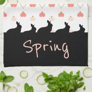 Bunny silhouettes in black with pink tea towel