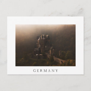 Burg Eltz castle in the morning fog Postcard