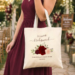 Burgundy & Blush Roses Bridesmaid Wedding Favour Tote Bag<br><div class="desc">These beautiful tote bags are a wonderful way to thank your bridesmaids for being part of your wedding party. They feature a lovely boho chic floral design with a cluster of hand painted watercolor roses in shades of burgundy, red, and blush pink, surrounded by sprigs of eucalyptus leaves and garden...</div>