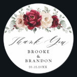 Burgundy Champagne Ivory Mauve Wedding Thank you Classic Round Sticker<br><div class="desc">Elegant Burgundy Red,  Champagne ivory earthy floral theme wedding thank you sticker featuring elegant bouquet of Burgundy,  champagne ivory colour roses peonies  and sage green eucalyptus leaves. Please contact me for any help in customisation or if you need any other product with this design.</div>