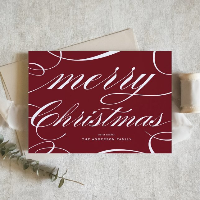Burgundy Elegant Flourish Script Merry Christmas Holiday Card (This elegant Christmas card features a beautiful flourish script on a rich burgundy background.)
