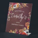 Burgundy Fall Flowers 18th Birthday Party Welcome Pedestal Sign<br><div class="desc">Beautiful fall flowers decorate two corners of this birthday party welcome sign. Red roses,  terracotta flowers and white peonies blend with deep green leaves and foliage. The flowers and white modern script pop against the burgundy red background. This item is part of the Burgundy Fall Flowers collection.</div>