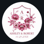 Burgundy floral crest and initials wedding classic round sticker<br><div class="desc">Burgundy floral Chinoiserie peony flower crest and initials wedding round sticker. Add a touch of elegance to your wedding with our round burgundy Chinoiserie sticker. It showcases a graceful peony crest framed by your own initials, marrying the refined charm of Chinese porcelain art with a sweet, romantic flair. The intricate...</div>