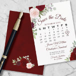 Burgundy Floral Elegant Boho Wedding Calendar Save The Date<br><div class="desc">This wedding Save the Date card features a rustic boho chic floral design with script lettering and hand painted watercolor roses in shades of blush pink, red and burgundy. There is a customizable calendar where you can put a heart around your wedding date with space for the couple's name &...</div>