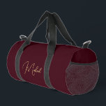 Burgundy Gold Monogram Gym Sports Travel Carry On Duffle Bag<br><div class="desc">Create your own custom, personalised, modern faux gold script / typography monogram monogrammed, lightweight, durable Polyester Poplin, men women solid burgundy travel gym sports carry-on duffle bag, with rugged 22" carry handles, removable and adjustable (27" to 48") shoulder strap with shoulder pad and metal swivel hooks, laminate lining with secondary...</div>