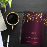 Burgundy gold stars name script glamourous 2025 planner<br><div class="desc">A dark burgundy background, decorated with faux gold dripping stars. Template for a year. Personalise and add a name and a title. The name is written with a golden modern hand lettered style script with swashes. Perfect for school, work or organising your personal/family life. To keep the swashes only delete...</div>