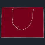 Burgundy Large Gift Bag<br><div class="desc">Burgundy is a deep, rich color that blends dark red with undertones of purple and sometimes brown. It is often described as sophisticated, luxurious, and warm, similar to the color of red wine from the Burgundy region of France. Characteristics Hue: A purplish-red or reddish-purple that is darker and warmer than...</div>