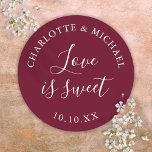 Burgundy Love Is Sweet Wedding Favour  Classic Round Sticker<br><div class="desc">Burgundy wedding favour love is sweet classic round sticker. Designed by Thisisnotme©</div>