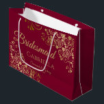 Burgundy Maroon & Gold Lace Elegant Bridesmaid Large Gift Bag<br><div class="desc">This beautiful gift bag is designed as a wedding gift or favour bag for Bridesmaids. It features an elegant burgundy, maroon, or wine red and gold design with golden lace frills in the corners the text "Bridesmaid" as well as a place to enter her name, the couple's name, and the...</div>