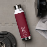 Burgundy Modern Typography Personalised Water Bottle<br><div class="desc">Trendy, vacuum insulated water bottle that features personalised name in white, modern typography on a trendy, burgundy colour background. Personalise bottle by editing name and replacing name with your own as desired. Perfect for a birthday gift, wedding groomsman gift, etc. Select your water bottle style. Select your water bottle style....</div>