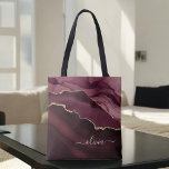 Burgundy Purple Agate Geode Gold Monogram Tote Bag<br><div class="desc">Burgundy - Purple and Gold Foil Agate Geode Monogram Beautiful Elegant Script Name Book Bag. This makes the perfect sweet 16, 13th, 15th, 16th, 18th, 21st, 30th, 40th, 50th, 60th, 70th, 80th, 90th, 100th birthday, wedding, bridal shower, anniversary, baby shower, graduation or bachelorette party gift for someone decorating her room...</div>