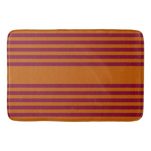 Burgundy red and burnt orange five stripe pattern. bath mat (Front)
