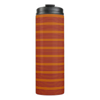 Burgundy red and burnt orange five stripe pattern.