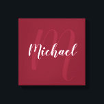 Burgundy Red personalised Monogram and Name Canvas Print<br><div class="desc">Personalised Monogram and Family Name Gift
featuring name in white modern script font style and monogram in light burgundy red modern script font style as background on burgundy red background.</div>