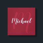 Burgundy Red personalised Monogram and Name Canvas Print<br><div class="desc">Personalised Monogram and Family Name Gift
featuring name in white modern script font style and monogram in light burgundy red modern script font style as background on burgundy red background.</div>