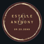 Burgundy Rustic Gold Circle Ampersand Wedding Classic Round Sticker<br><div class="desc">This wedding sticker features a faux gold circle frame with an elegant ampersand and simple calligraphy with a burgundy marsala background.</div>