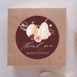 Burgundy Rustic Pumpkin Wedding Thank You Classic Round Sticker<br><div class="desc">This wedding thank you sticker features watercolor white and yellow pumpkins adorned with burgundy,  maroon,  and blush pink flowers over fall leaves.  For more advanced customisation of this design,  Please click the "Customise further" link.  Matching items are also available.</div>