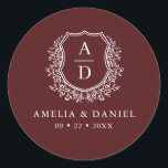 Burgundy White Crest Modern Monogram Wedding  Classic Round Sticker<br><div class="desc">Add a touch of elegance and warmth to your wedding with the Burgundy White Crest Modern Monogram Wedding Classic Round Sticker. Featuring a rich burgundy background, a refined white crest design, and a personalised monogram, this sticker is perfect for enhancing your wedding invitations, favours, or decor. Its classic yet modern...</div>