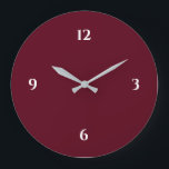 Burgundy Wine Coloured Minimalist Large Clock<br><div class="desc">Modern clock features a minimalist design in a burgundy colour palette with white accents. A simple plain design with white numbers on a burgundy wine coloured background. A trendy addition to your kitchen, living room or office wall, a thoughtful modern office gift or modern home gift for any occasion. You...</div>